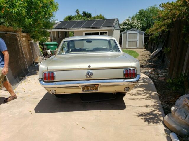 1966 beige Ford Mustang Coupe