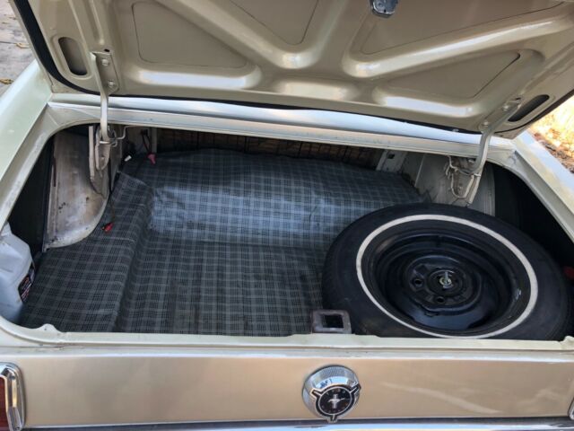 1966 beige Ford Mustang Coupe