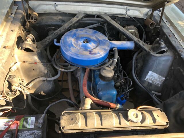 1966 beige Ford Mustang Coupe