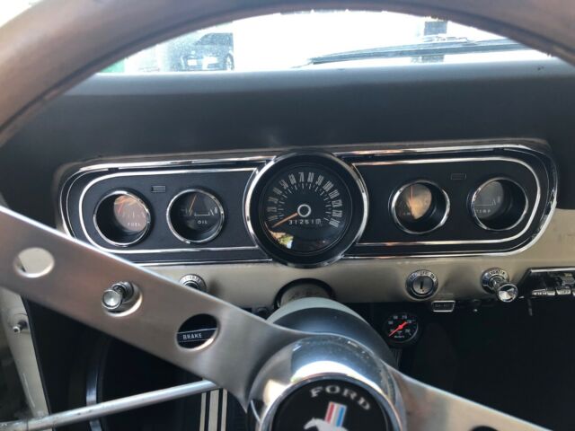 1966 beige Ford Mustang Coupe