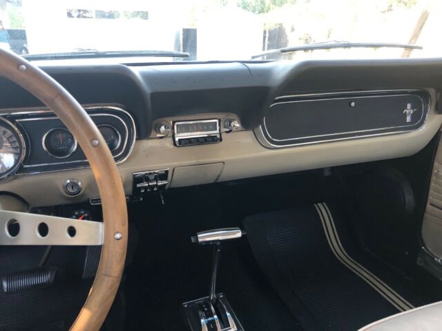 1966 beige Ford Mustang Coupe