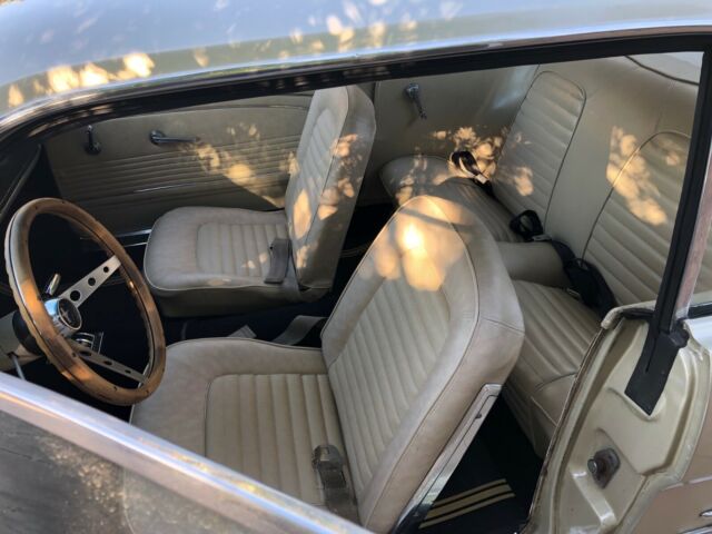 1966 beige Ford Mustang Coupe