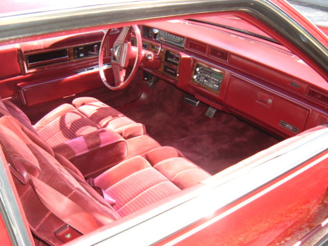 1988 Red Cadillac DeVille Coupe