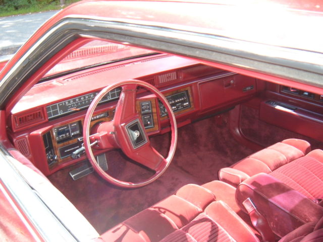 1988 Red Cadillac DeVille Coupe