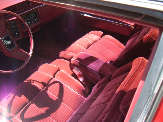 1988 Red Cadillac DeVille Coupe