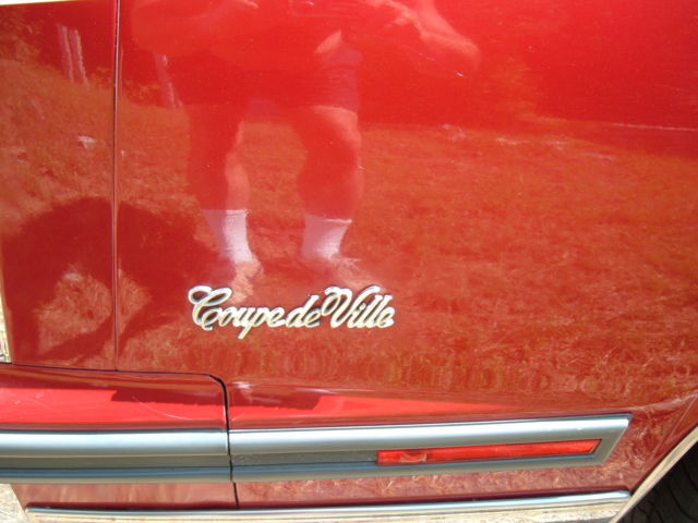 1988 Red Cadillac DeVille Coupe