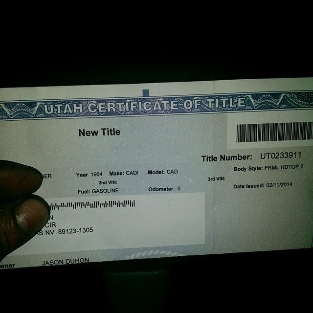 1964 White Cadillac DeVille Coupe