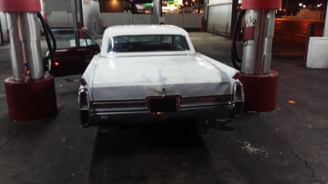 1964 White Cadillac DeVille Coupe