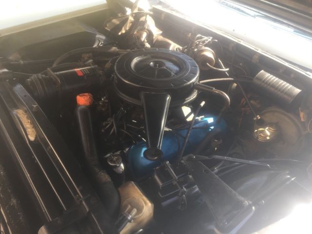 1966 Blue Cadillac DeVille Convertible