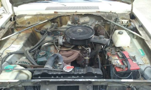 1975 White Plymouth Valiant Coupe