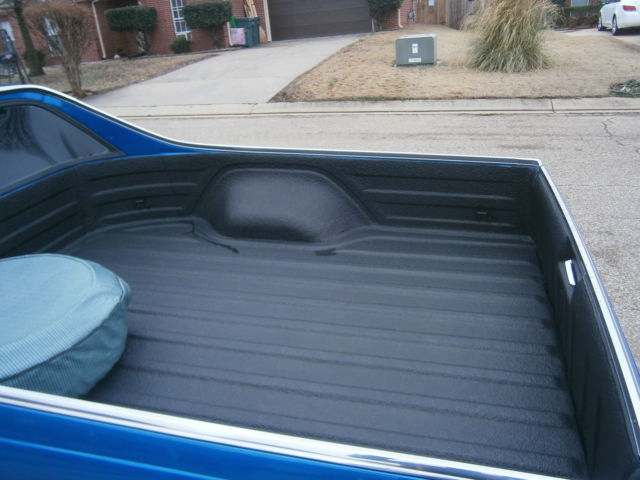 1980 blue and silver Chevrolet El Camino 2 door