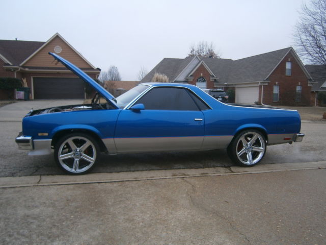 1980 blue and silver Chevrolet El Camino 2 door