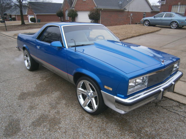 1980 blue and silver Chevrolet El Camino 2 door