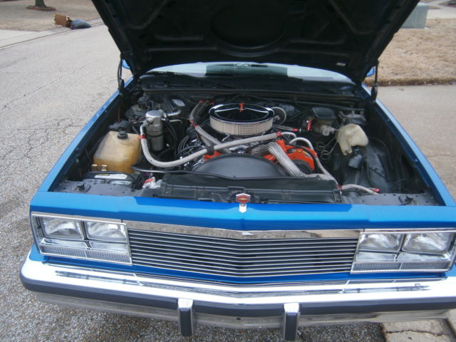 1980 blue and silver Chevrolet El Camino 2 door