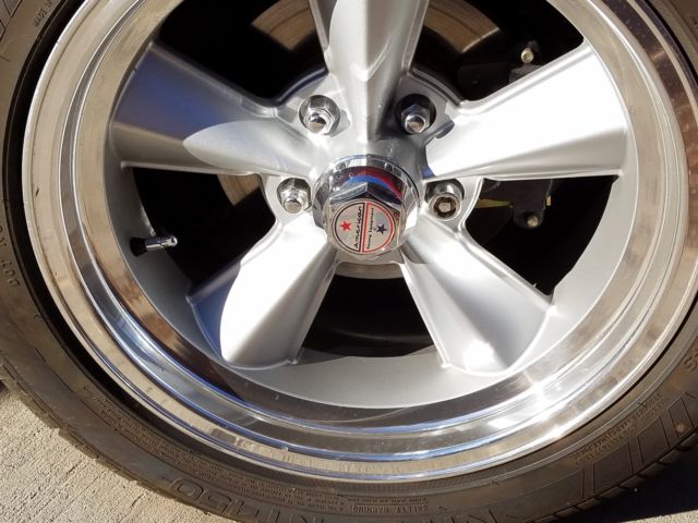 1966 red Chevrolet Chevelle Coupe