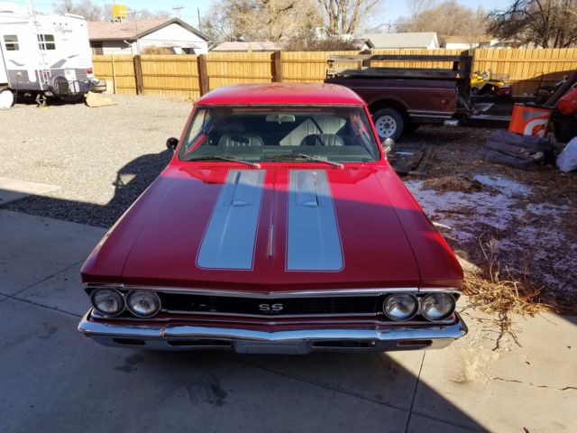 1966 red Chevrolet Chevelle Coupe