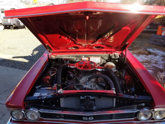 1966 red Chevrolet Chevelle Coupe