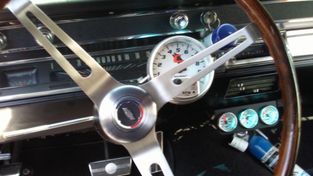 1967 orange Chevrolet Chevelle Coupe