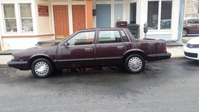 1987 purple/burgundy Chevrolet Sedan