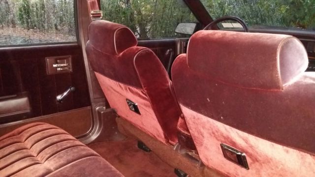 1987 purple/burgundy Chevrolet Sedan