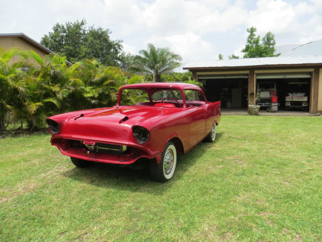 1957 Red Chevrolet Bel Air/150/210 Coupe