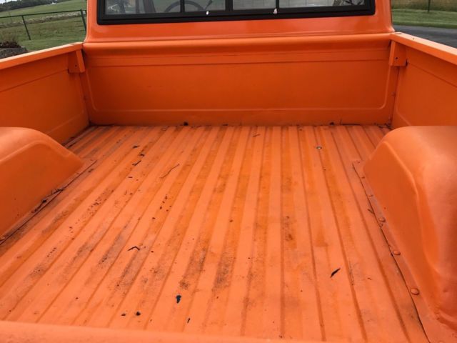 1971 Orange and white Chevrolet C-10 Pickup