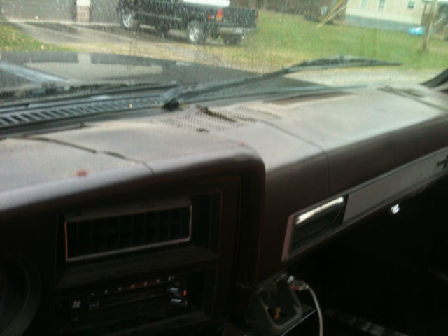 1987 Black and silver Chevrolet C-10 Standard Cab Pickup