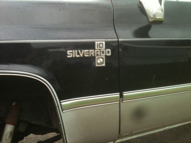 1987 Black and silver Chevrolet C-10 Standard Cab Pickup