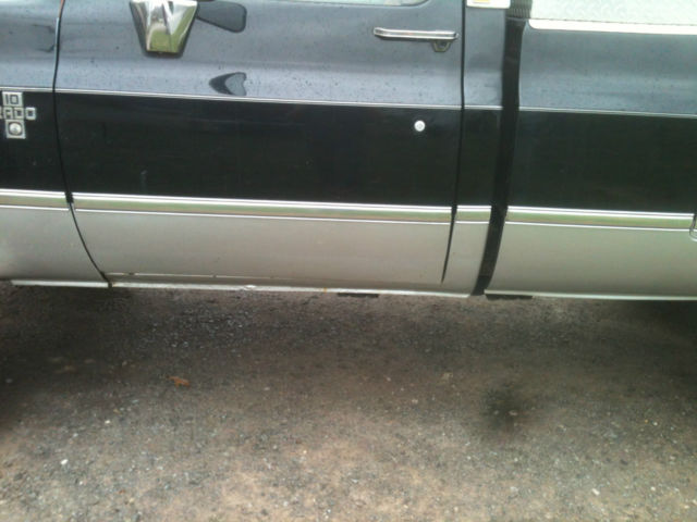 1987 Black and silver Chevrolet C-10 Standard Cab Pickup