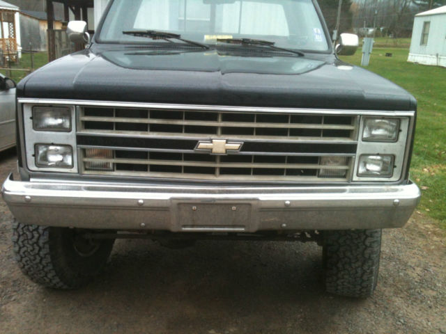 1987 Black and silver Chevrolet C-10 Standard Cab Pickup