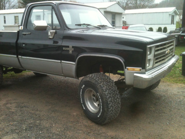 1987 Black and silver Chevrolet C-10 Standard Cab Pickup