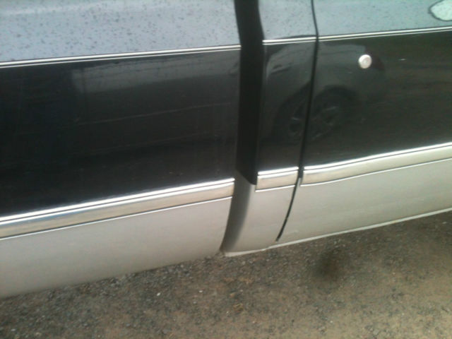 1987 Black and silver Chevrolet C-10 Standard Cab Pickup