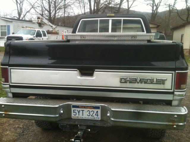 1987 Black and silver Chevrolet C-10 Standard Cab Pickup
