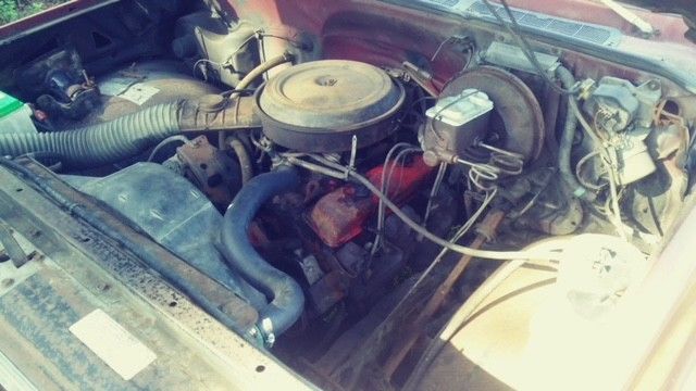 1976 Red Chevrolet C-10 pick up truck