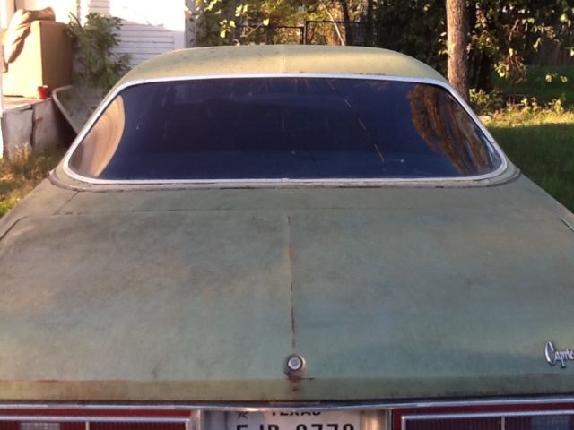 1975 Orange Chevrolet Capriceold