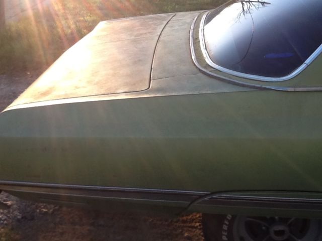 1975 Orange Chevrolet Capriceold