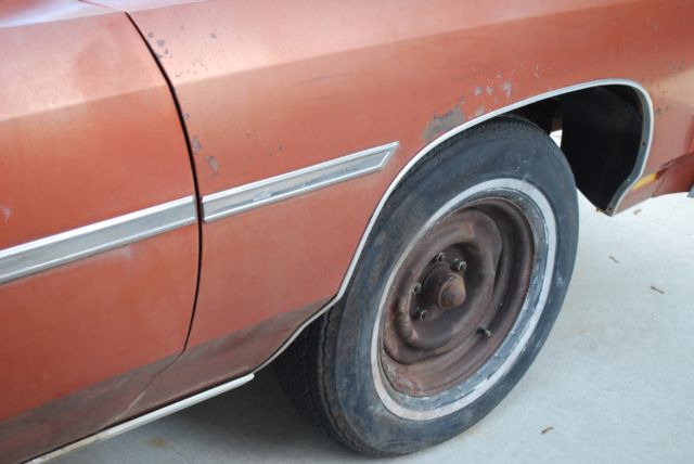 1975 Orange Chevrolet Capriceold