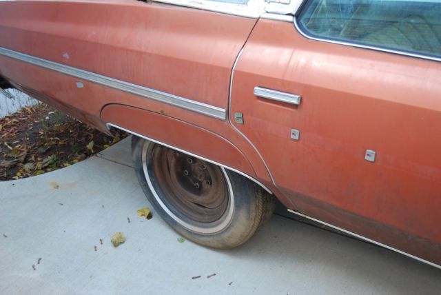 1975 Orange Chevrolet Capriceold