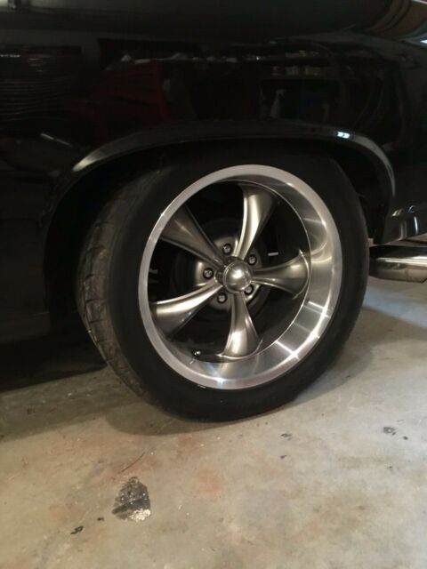 1968 black and burgundy with silver stripe Chevrolet Chevelle Coupe