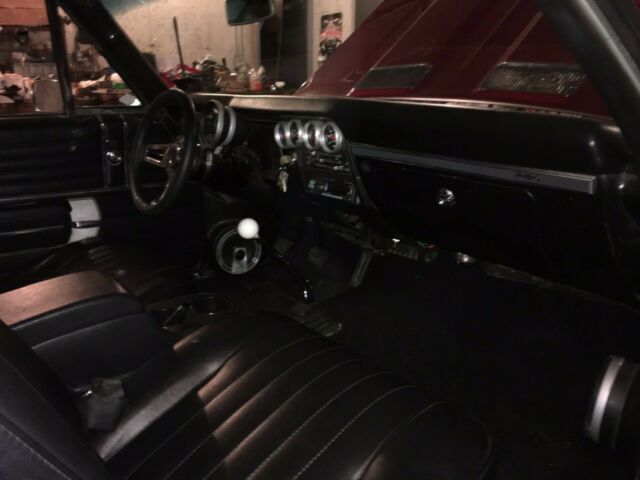 1968 black and burgundy with silver stripe Chevrolet Chevelle Coupe