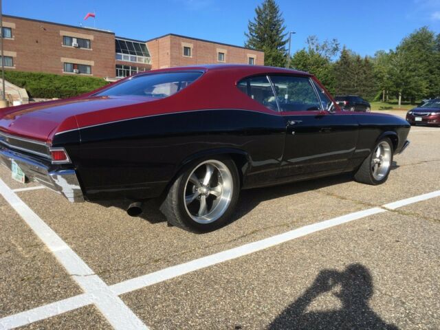 1968 black and burgundy with silver stripe Chevrolet Chevelle Coupe