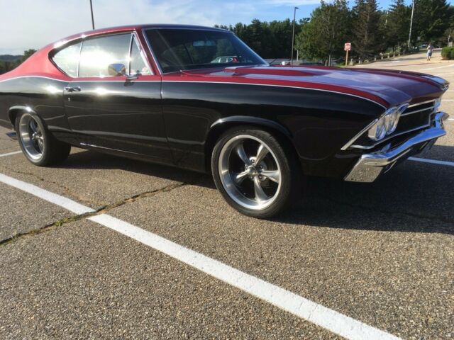 1968 black and burgundy with silver stripe Chevrolet Chevelle Coupe