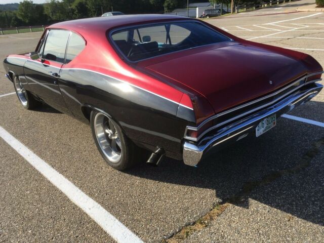 1968 black and burgundy with silver stripe Chevrolet Chevelle Coupe