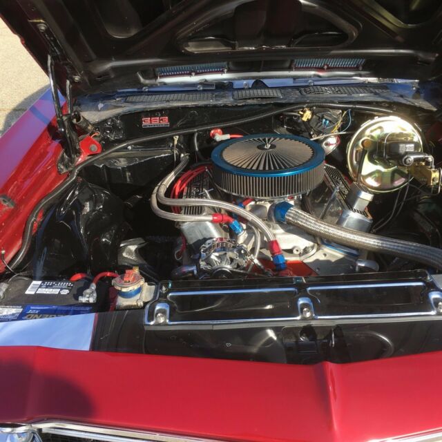 1968 black and burgundy with silver stripe Chevrolet Chevelle Coupe