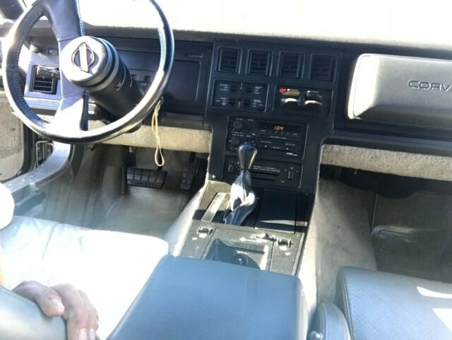 1984 Silver & Burgundy Chevrolet Corvette Coupe