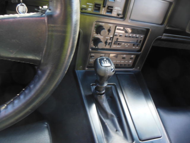 1986 maroon Chevrolet Corvette Coupe