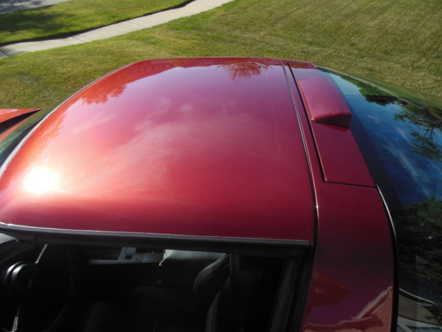 1986 maroon Chevrolet Corvette Coupe