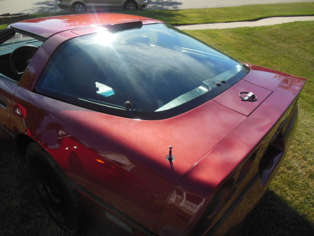 1986 maroon Chevrolet Corvette Coupe
