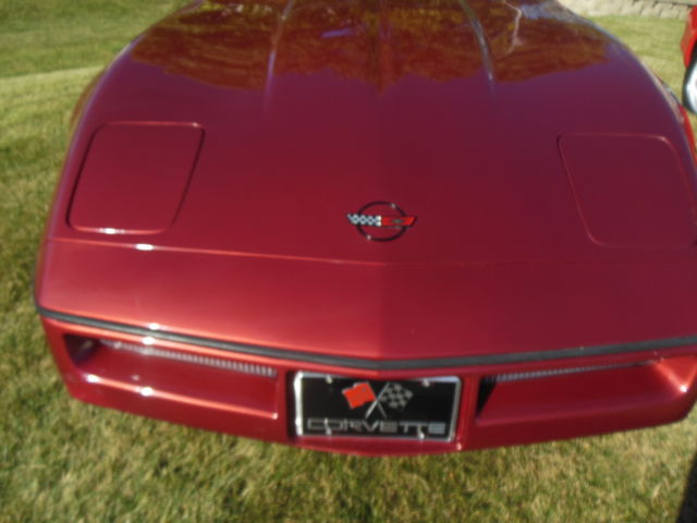 1986 maroon Chevrolet Corvette Coupe