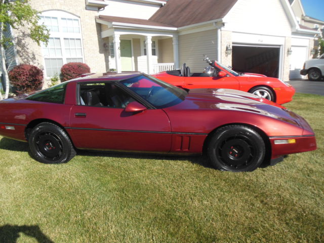 1986 maroon Chevrolet Corvette Coupe